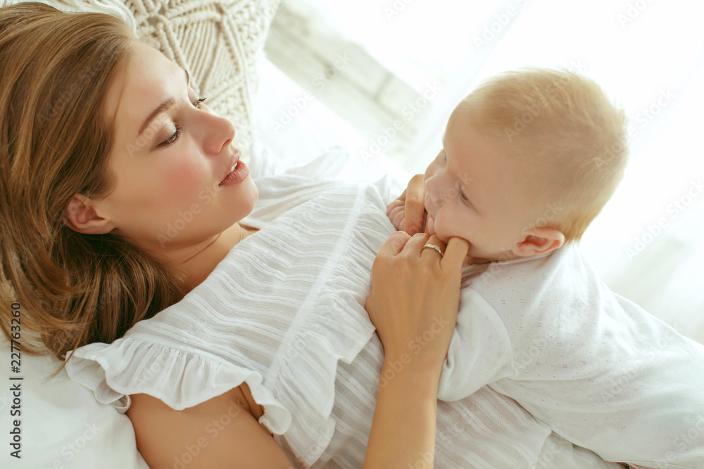 Beautiful woman with a baby Beautiful woman with a baby