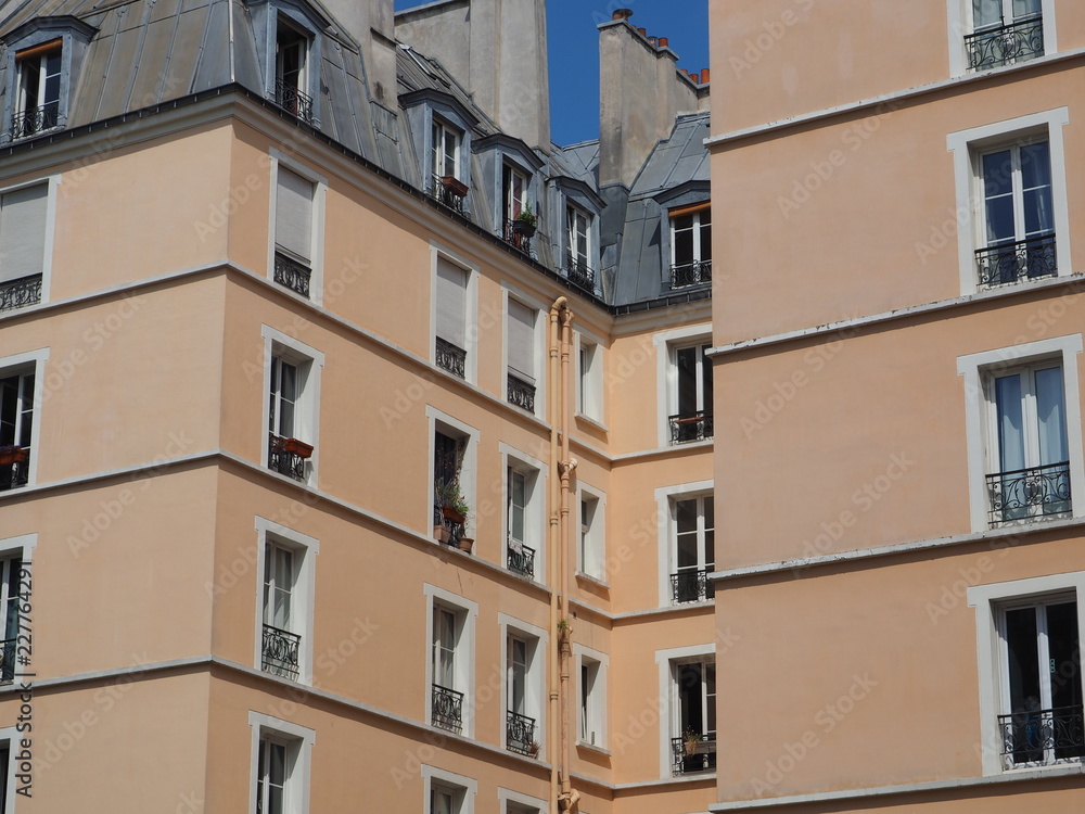 Classic light-peach plaster building Classic light-peach plaster building