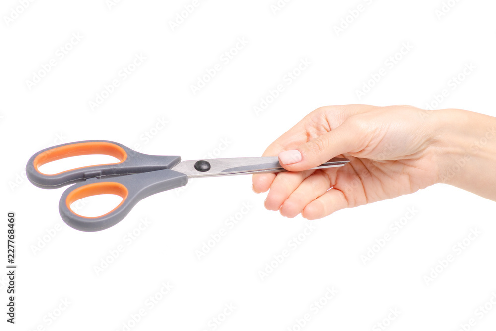 Scissors in hand on white background. Isolation. Scissors in hand on white background. Isolation.