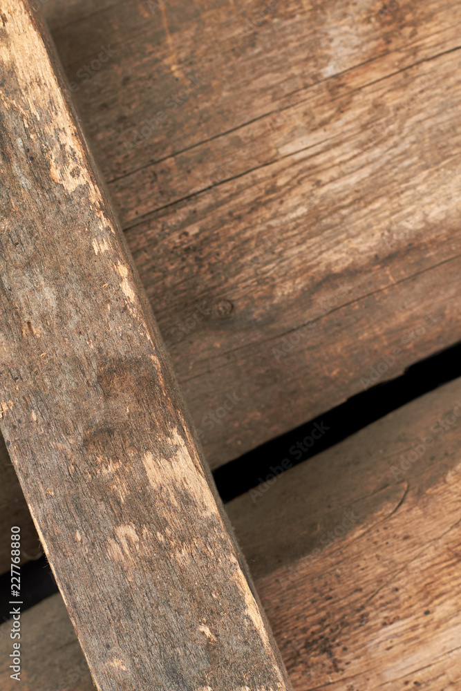 Aged wooden boards background. Grunge wooden planks close up. Cracked wooden backdrop. Aged wooden boards background. Grunge wooden planks close up. Cracked wooden backdrop.