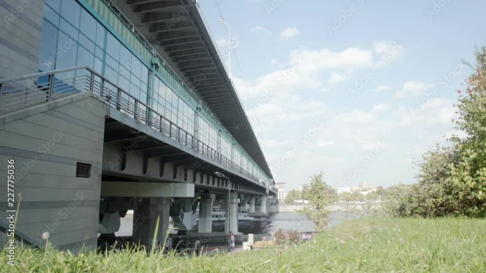 Glass bridge with a floating ship beneath it Glass bridge with a floating ship beneath it