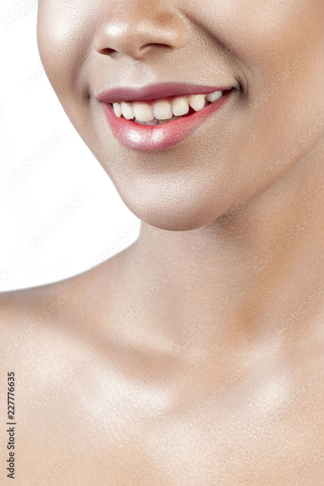 Smiling young beautiful girl with clean perfect skin close-up Smiling young beautiful girl with clean perfect skin close-up