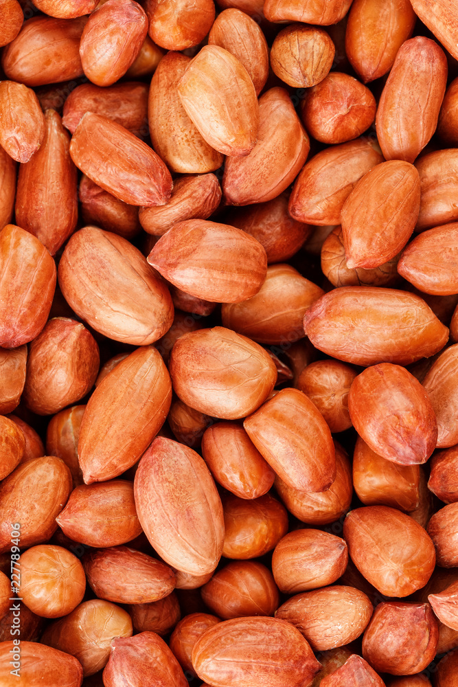 Peanuts, for background or textures. Uncleaned inshell peanuts. Peanuts, for background or textures. Uncleaned inshell peanuts.