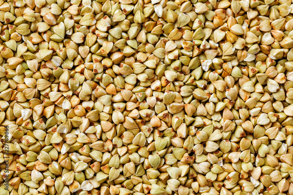 raw green buckwheat background, organic vegan food. Texture raw green buckwheat background, organic vegan food. Texture