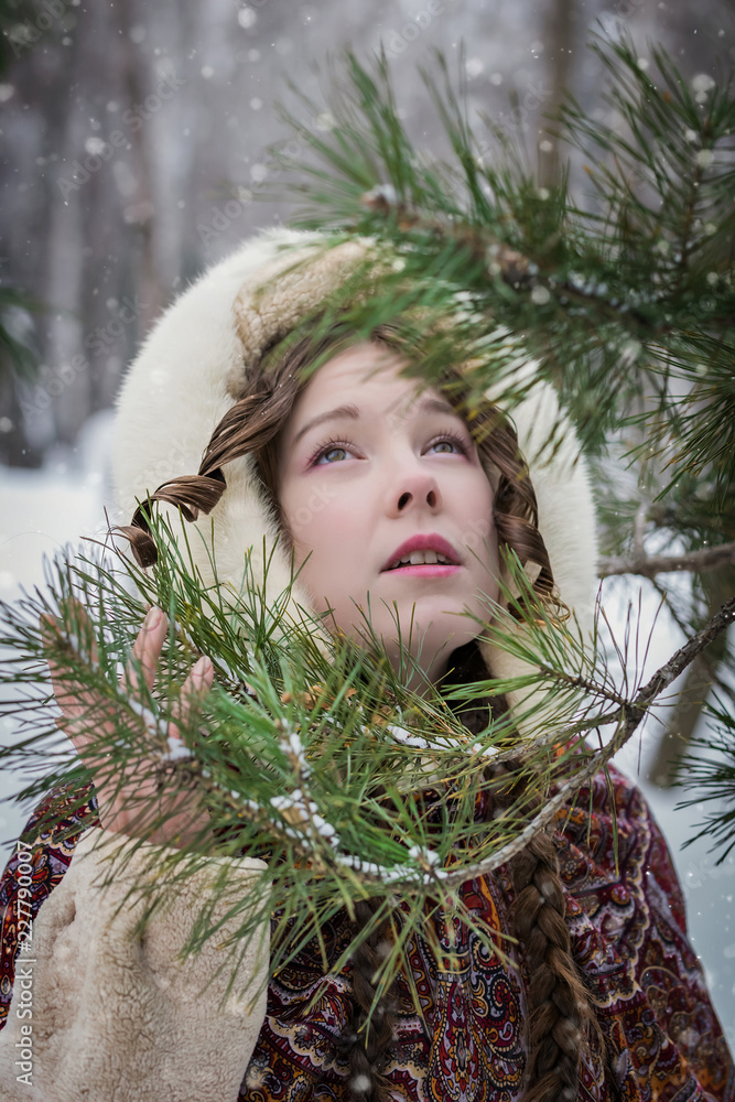 Portrait russian girl smile in national kerchief and fur coat on winter day Portrait russian girl smile in national kerchief and fur coat on winter day