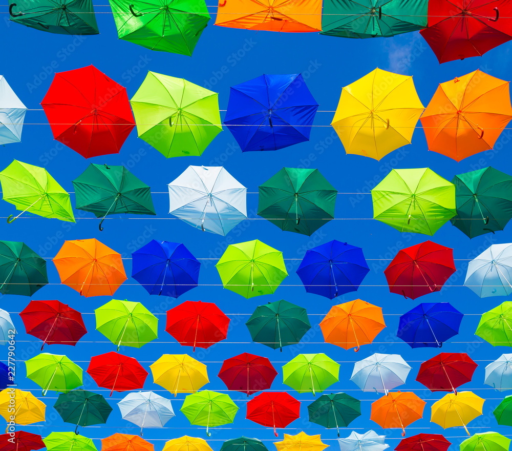 Naklejka premium City. Colorful umbrellas