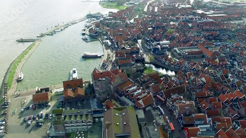 Volendam town in North Holland Flying Over Redtop Homes Slowly Descending photo