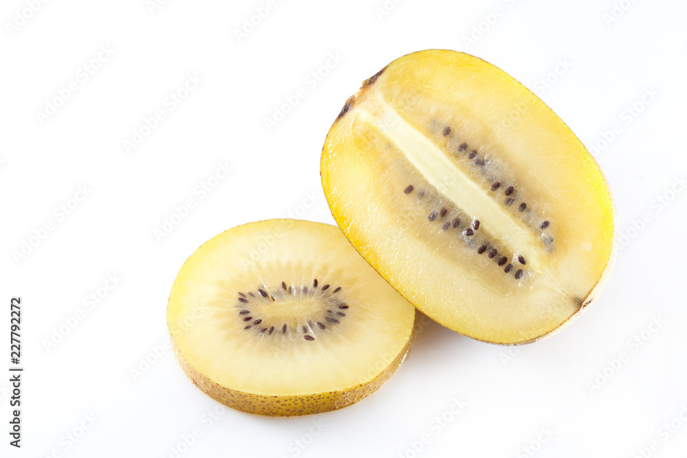 gold kiwifruit and some slices isolated on white background gold kiwifruit and some slices isolated on white background