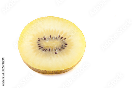 gold kiwifruit and some slices isolated on white background