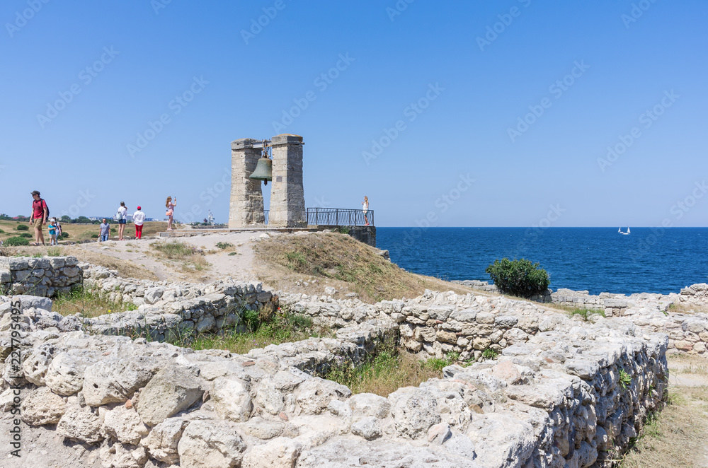 Misty bell and the ruins of the ancient Chersonese. Russia, the Republic of Crimea, the city of Sevastopol. 11.06.2018: The ruins of the ancient and medieval city of Chersonese Tauride