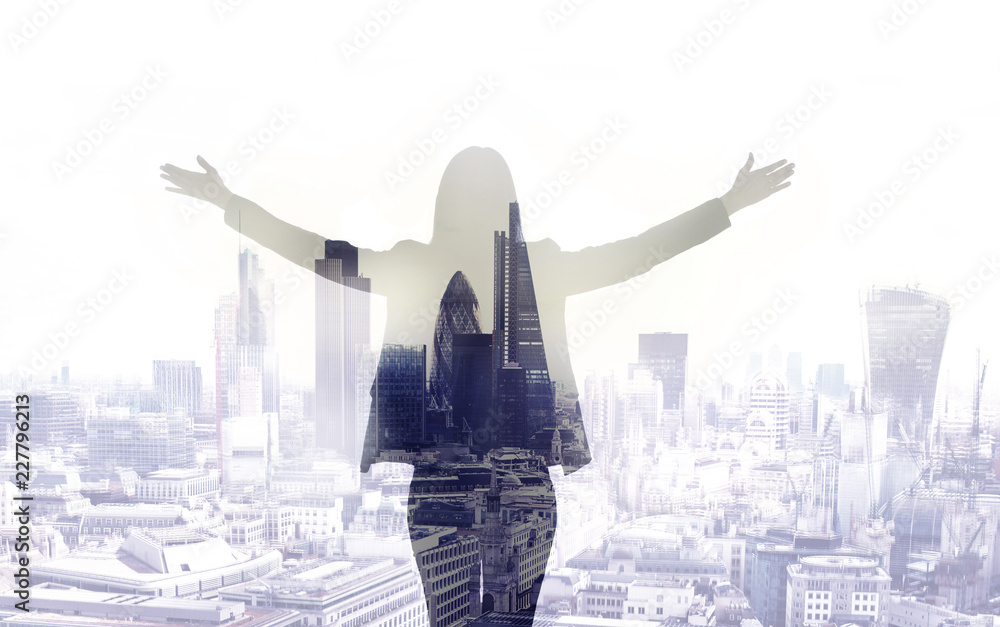 Young woman looking over the City of London at the early morning time. Future, new business opportunity and business success concept. - obrazy, fototapety, plakaty 