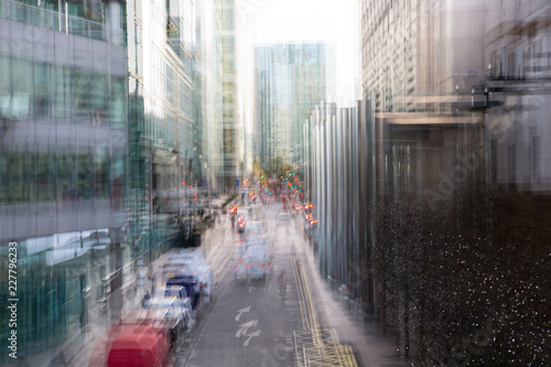 Canary Wharf, Bank street with taxis. Blurred image for background. London, UK
