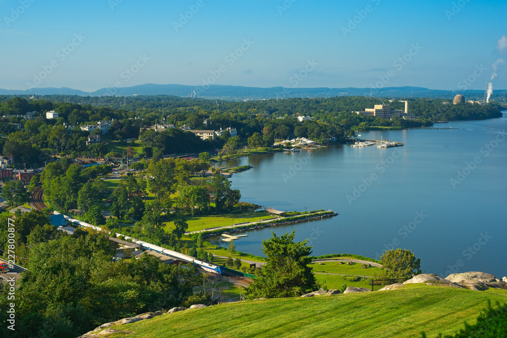 Hudson River vista with passenger train
