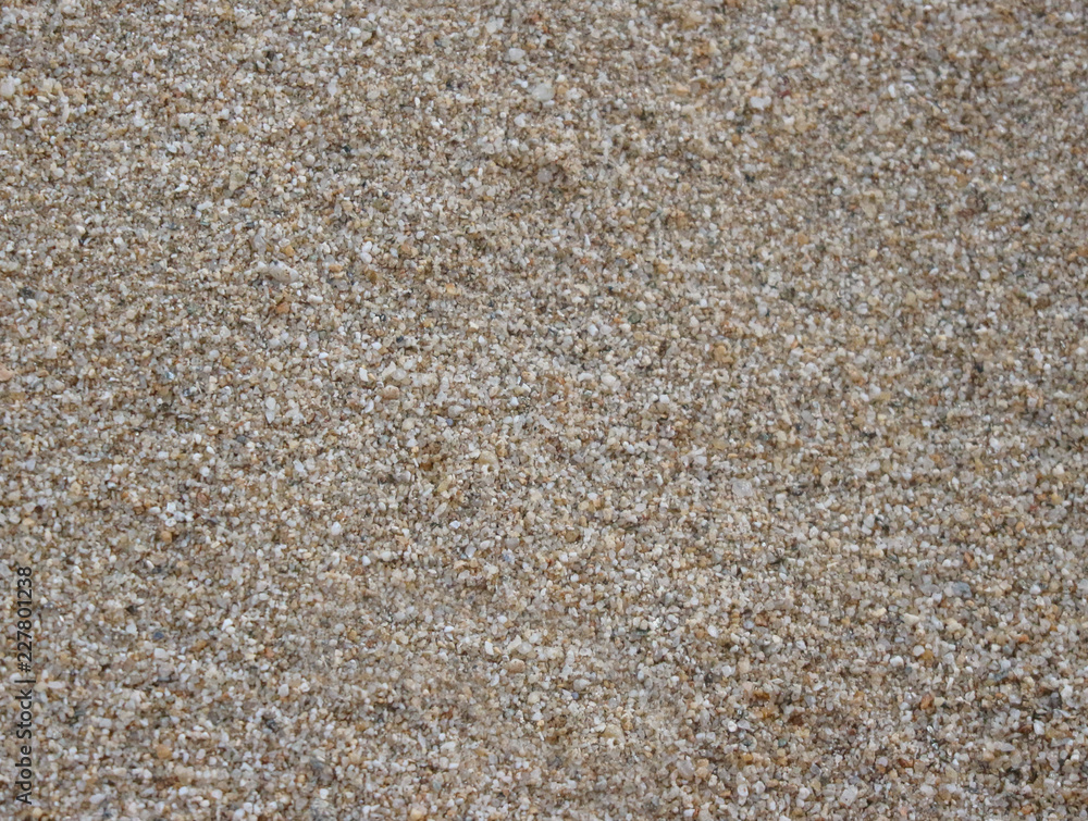 Close up on natural brown sand beach texture background. Close up on natural brown sand beach texture background.