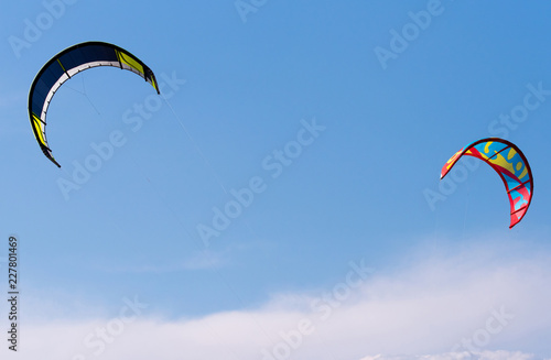Kites flying in the sky. Kiteboarding kites.