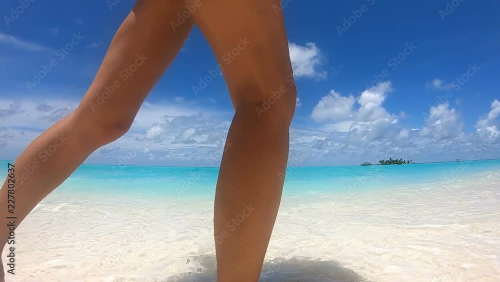 Girl Walks on the Beach on Maldives, 240 fps Full HD 1080. Girl Walks on the Beach on Maldives, 240 fps Full HD 1080.