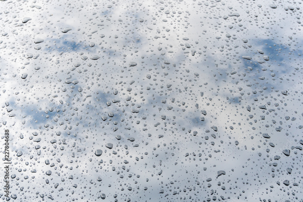 Obraz premium rain drop on car surface