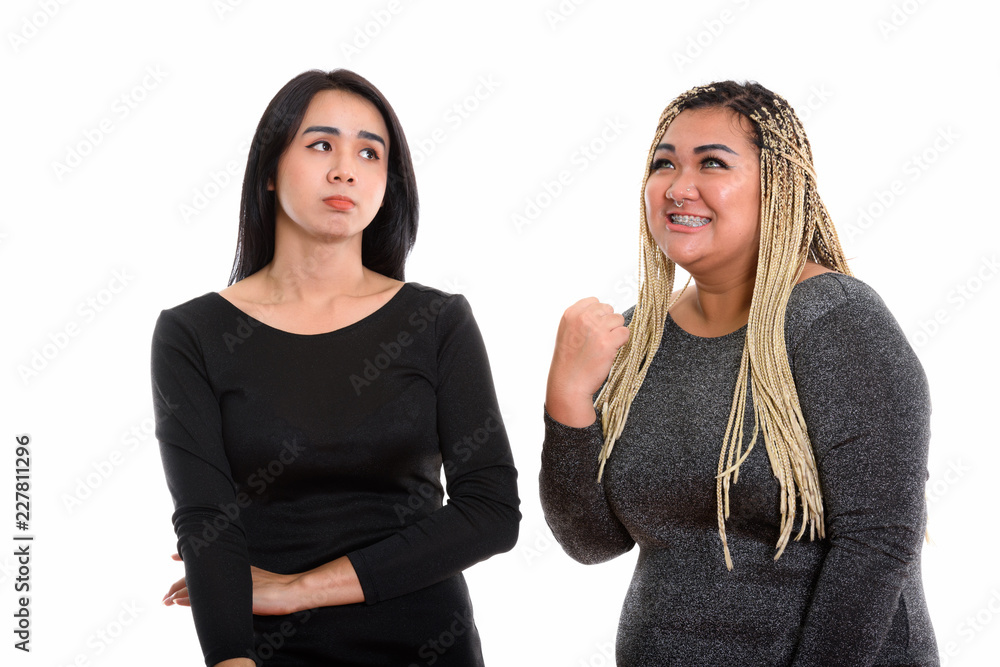 Thoughtful Asian transgender woman looking sad with happy fat As Thoughtful Asian transgender woman looking sad with happy fat As