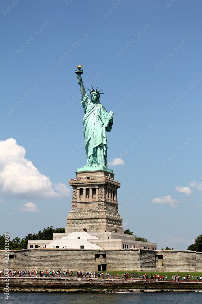 Fototapeta premium NEW YORK - AUGUST 5, 2014: Statue of Liberty on Liberty Island in New York Harbor, is one of the most recognizable landmarks