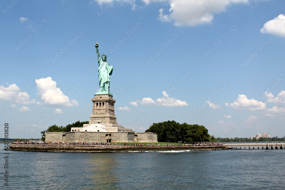 Fototapeta premium NEW YORK - AUGUST 5, 2014: Statue of Liberty on Liberty Island in New York Harbor, is one of the most recognizable landmarks
