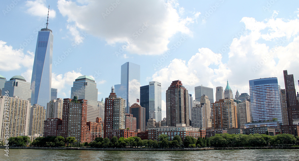 Obraz premium Manhattan Skyline with One World Trade Center Building over Hudson River, New York City, USA, August 8, 2017