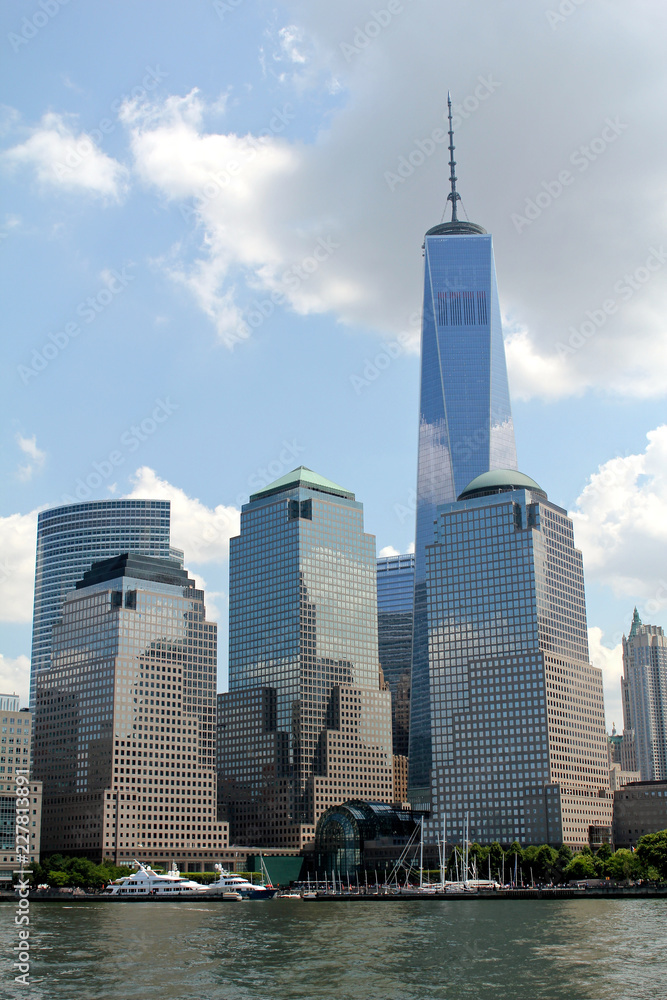 Manhattan Skyline with One World Trade Center Building over Hudson River, New York City, USA, August 8, 2017 Manhattan Skyline with One World Trade Center Building over Hudson River, New York City, USA, August 8, 2017