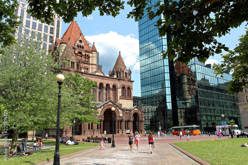Boston, USA - July 31, 2014: The John Hancock Building and Trinity Church at Copley Square in Boston, Massachusetts. photo