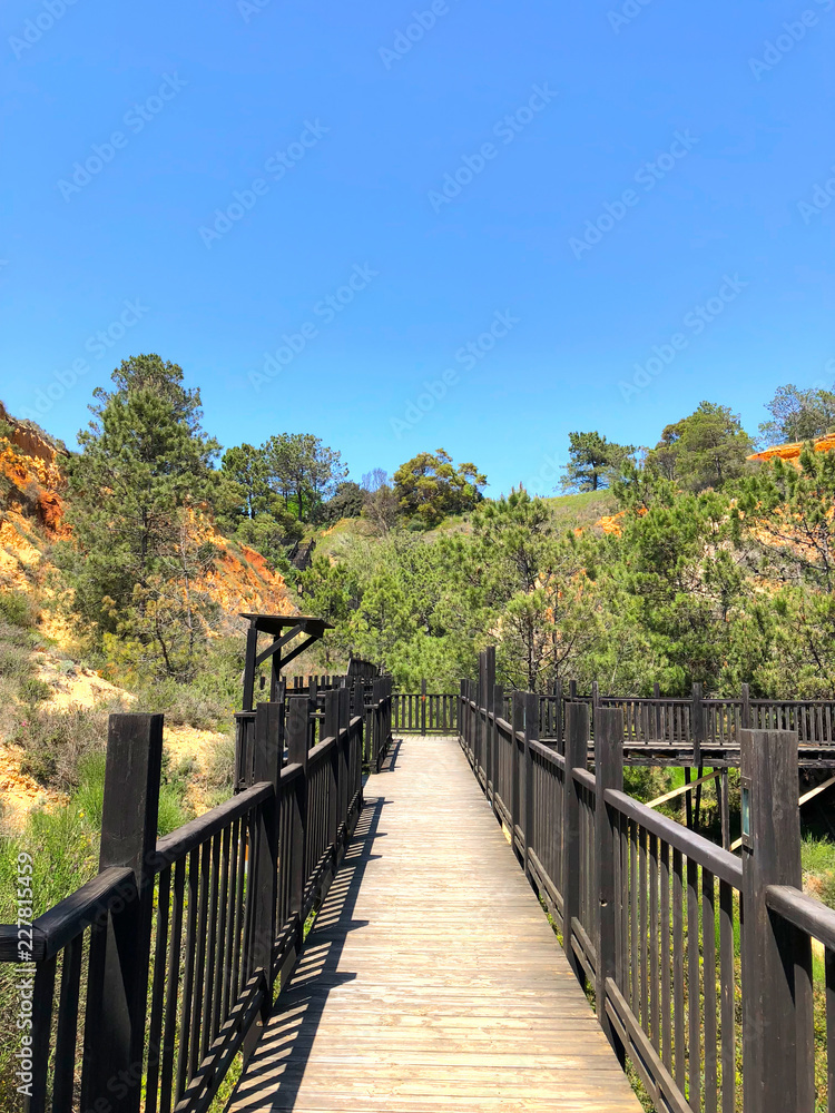 A wooden walkway to the beach in Algarve, Portugal