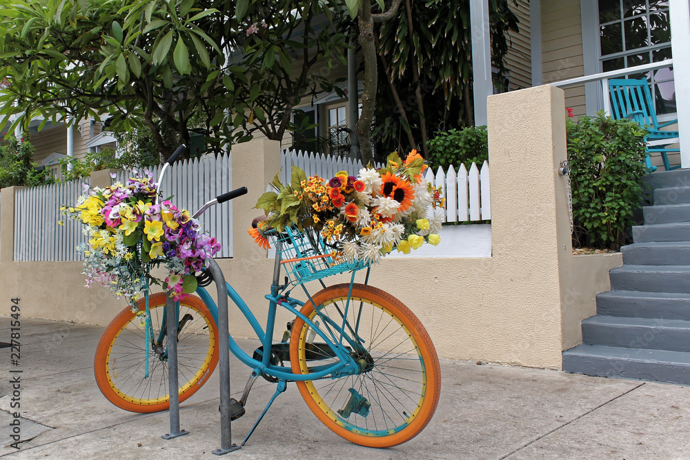 Key West, Florida, USA - July 21, 2016: Bike with flowers in Duval St in Key West