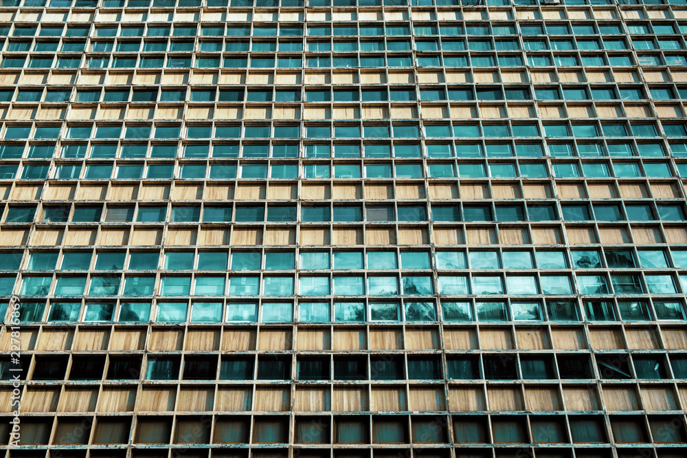 Many windows on facade of high-rise building Abstract pattern. Many windows on facade of high-rise building Abstract pattern.