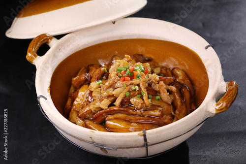 Salted fish and eggplant in clay pot