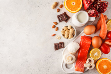 Allergy food concept. Allergies to fish, eggs, citrus fruits, chocolate, mushrooms and nuts.