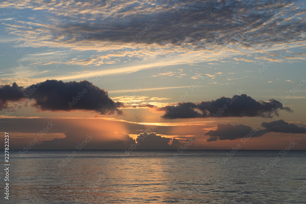 Cloudy sunset over ocean