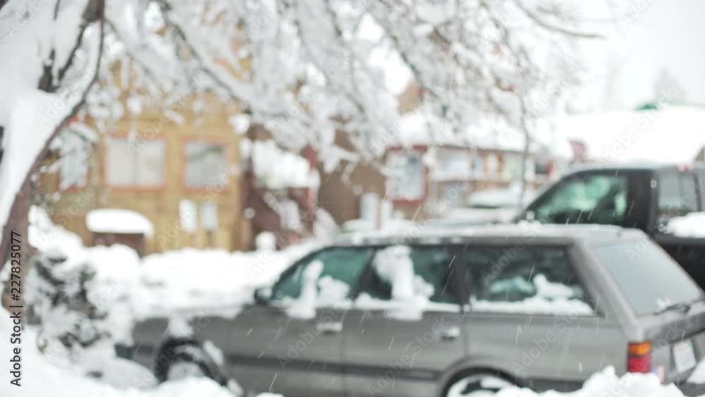Snowy car parking lot near snow covered houses for background plate Snowy car parking lot near snow covered houses for background plate