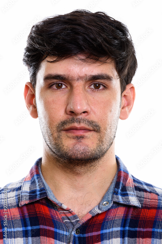Fototapeta premium Studio shot of face of young Persian man
