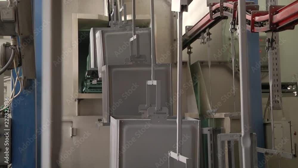 Automatic powder coating line. Powder coating of metal parts. Powder coating of metal parts with thermal polymerization paint. Automatic powder coating line. Powder coating of metal parts. Powder coating of metal parts with thermal polymerization paint.