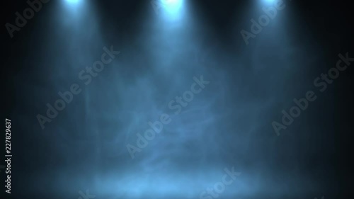 Three stage lights shining at studio. Seamless looping animation. photo