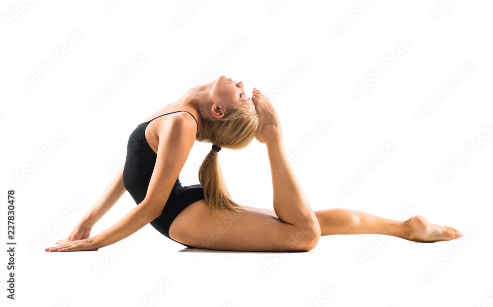 Young blonde woman in maillot practicing yoga lesson Young blonde woman in maillot practicing yoga lesson