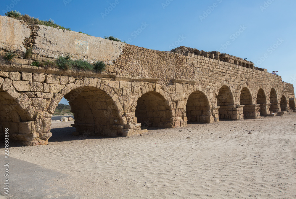 Ancient aqueduct at Caesarea. Israel