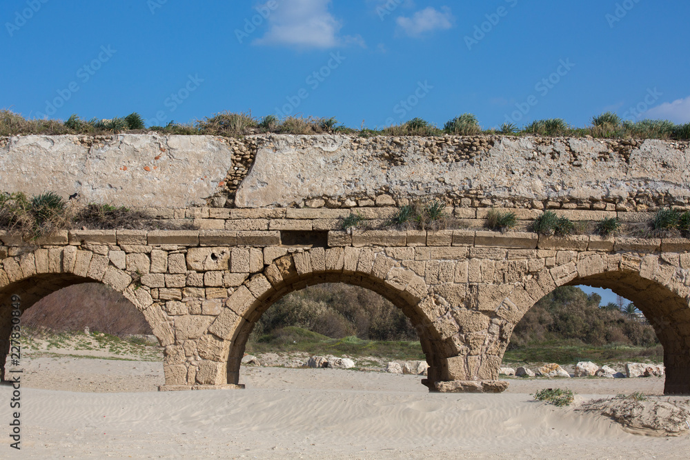 Ancient aqueduct at Caesarea. Israel