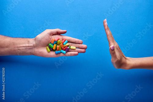 Campaign advertising against drugs, against chemical and non-natural drugs. A woman stands for traditional medicine and natural medicines. Refusal of synthetic drugs.