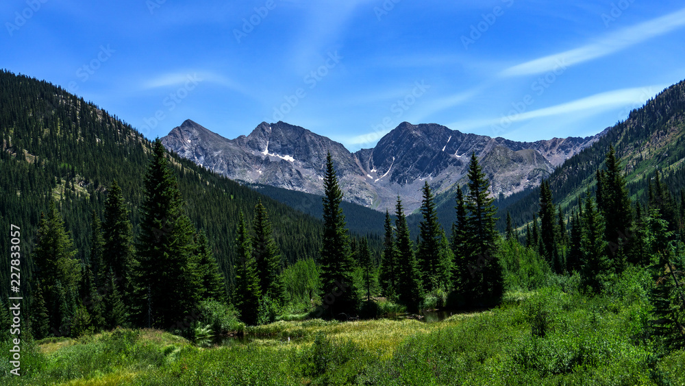 Colorado mountain peaks from valley
