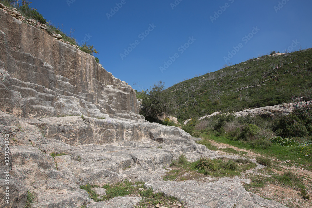 Old abandoned stone quarry on Carmel mount in Haifa, Israel