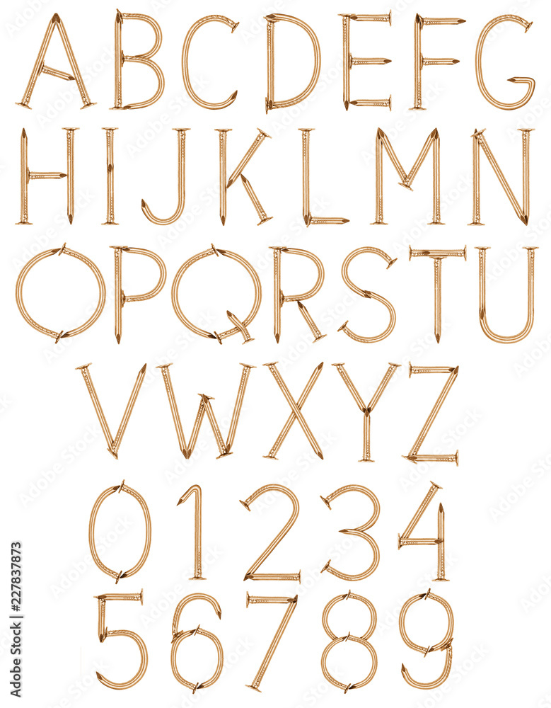 Alphabet and numbers made of golden nails on white background Alphabet and numbers made of golden nails on white background