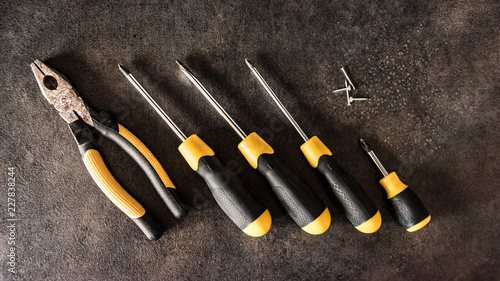black and yellow screwdrivers close-up