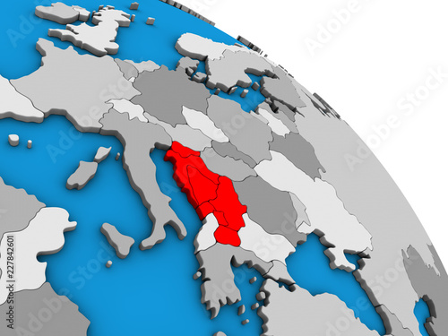 Yugoslavia on simple blue political 3D globe. photo
