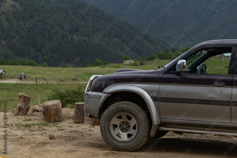 4x4 Parked in a mountain road in Omalo, Georgia country. 4x4 Parked in a mountain road in Omalo, Georgia country.