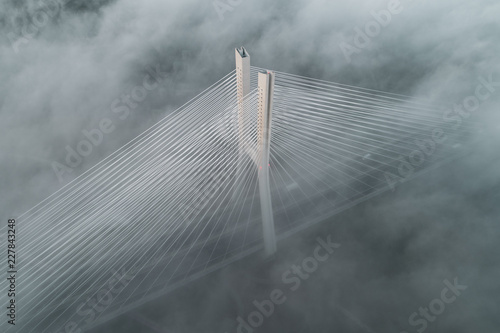 Fototapeta Naklejka Na Ścianę i Meble -  Redzinski bridge in the clouds aerial view