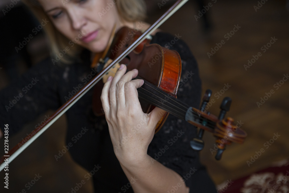 Violin player violinist classical music playing. Orchestra musical instruments Violin player violinist classical music playing. Orchestra musical instruments