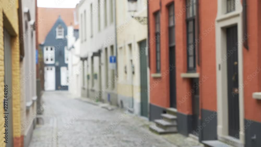 Blurred background plate of narrow cobblestone street in Europe for compositing Blurred background plate of narrow cobblestone street in Europe for compositing